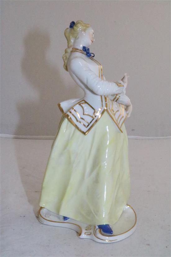 A Nymphenburg porcelain figure of Julia, after the Komedia Del arte figure by Bustelli, 20th century, 8.25in.